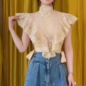 Zimmerman beige top.